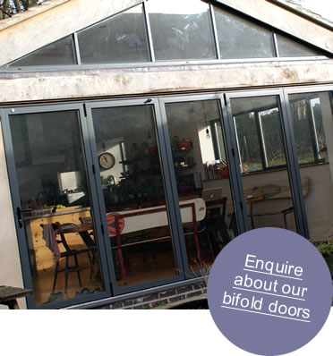 An aluminium bifold door with view onto patio area